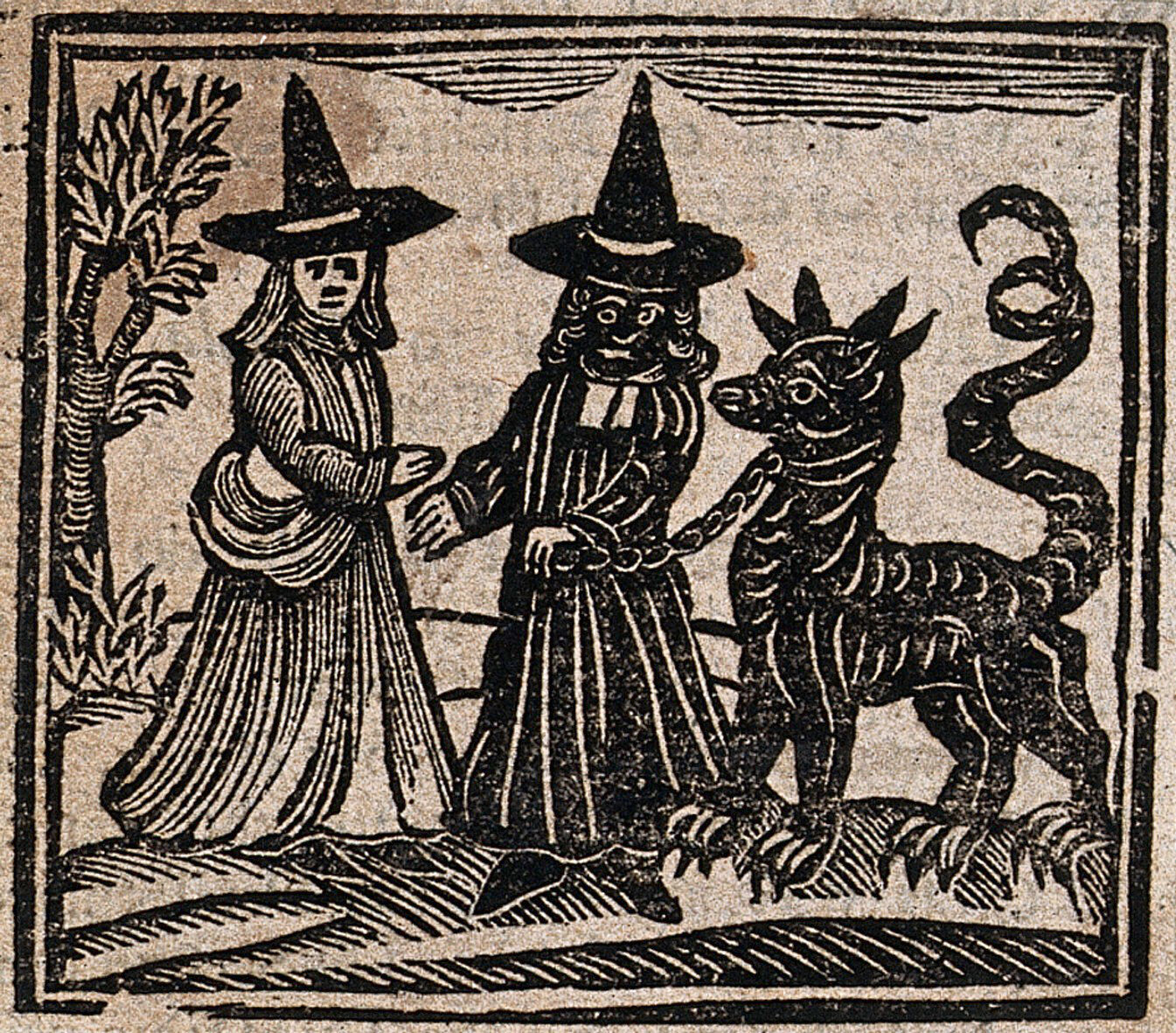 Witchcraft: a white faced witch meeting a black faced witch with a