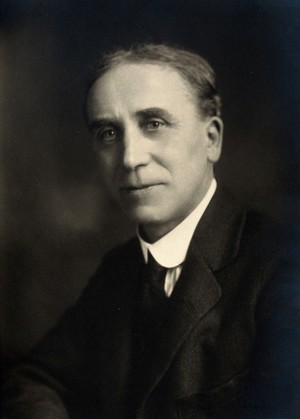 view R.W. Innes-Smith. Photograph by Elliott and Fry.
