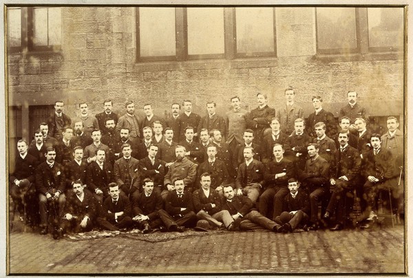 Edinburgh School of Anatomy: Christopher Martin (?) with students. Photograph, ca. 1889.