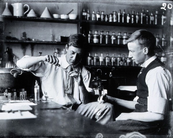 Louis Cobbett and Alfred Clark in the Pathology Department of Cambridge University. Copy photograph, ca. 1960 after the original photograph, ca. 1905 (?).