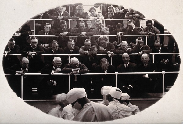 British Orthopaedic Association members view an operation performed by Vittorio Putti and staff at the Rizzoli Institute, Bologna. Photograph, 1924.