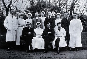 view A hospital ward (acute surgical?), Newcastle: nursing and medical staff group portrait, April 1924. Copy photograph after the 1924 original.