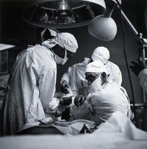 view British Postgraduate Medical School, Hammersmith: G. Grey Turner operating, 1946. Photograph by K.W. Wilkinson, 1946.