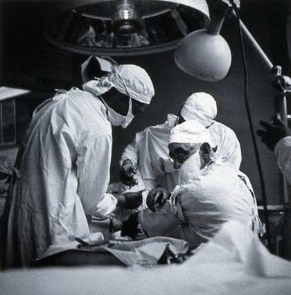 British Postgraduate Medical School, Hammersmith: G. Grey Turner operating, 1946. Photograph by K.W. Wilkinson, 1946.