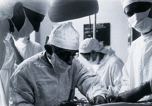 view British Postgraduate Medical School, Hammersmith: G. Grey Turner operating, 1946. Photograph by K.W. Wilkinson, 1946.