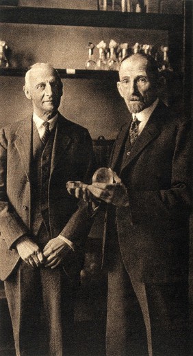 Simon Flexner (left), Director of the Rockefeller Institute, New York, with Professor Neufeld (right), on his visit to the Robert Koch Institute, Berlin. Process print, 1932 (?).
