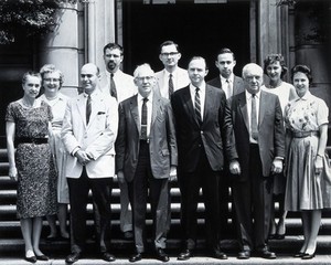 view Johns Hopkins University, Baltimore: the Institute for the History of Medicine: staff standing on the steps. Photograph, 1961.