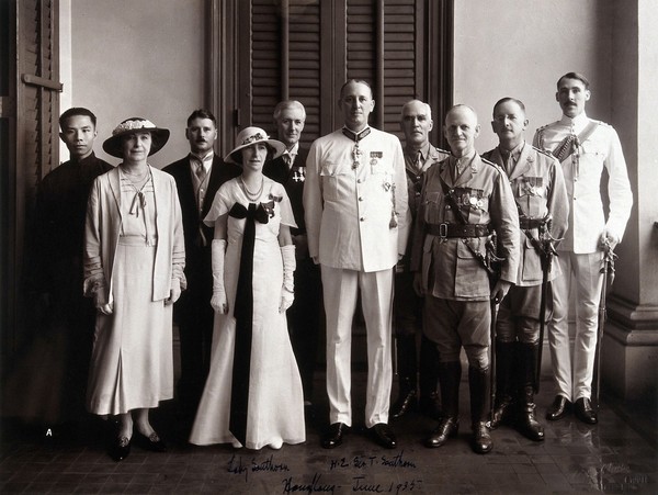 Sir Thomas Southorn and Lady Southorn with a group, Hong Kong. Photograph, 1935.