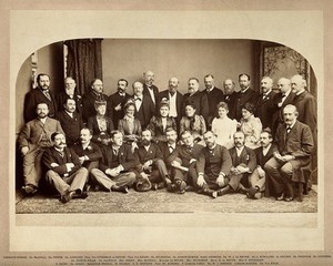 view Medical practitioners, men and women: group portrait. Photograph, ca. 1910.