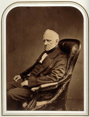 view An unidentified man in an armchair. Photograph attributed to Maull & Polyblank.