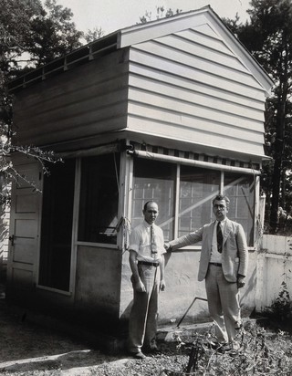 Mark Boyd and one unidentified man. Photograph.