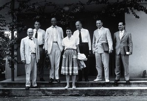 view Seven tropical disease scientists. Photograph.