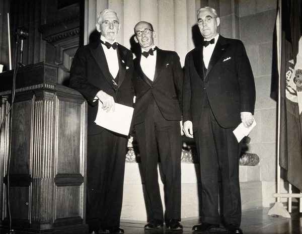 Three scientists at the Washington Congress of Tropical Medicine. Photograph, 1948.