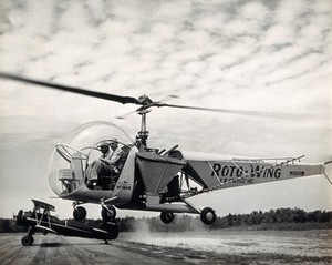 view Sir Gordan Covell in a helicopter, Beltsville, Maryland. Photograph, 1948.