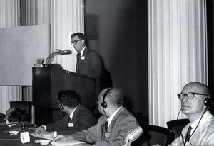 view Don E. Eyles, speaking at a lectern. Photograph.