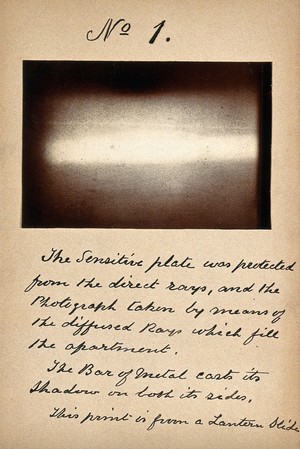 view Light emitted by Röntgen Ray Tubes: a metal bar. Photoprint from radiograph, by James Wimshurst, 1898.