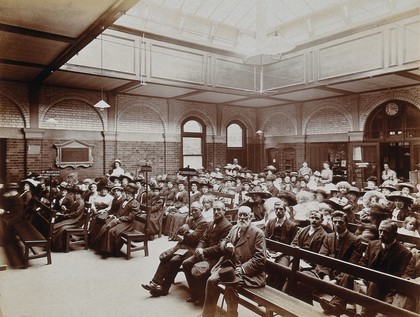 Great Northern Central Hospital, Holloway Road, London: the out-patient waiting room. Photograph, 1912.