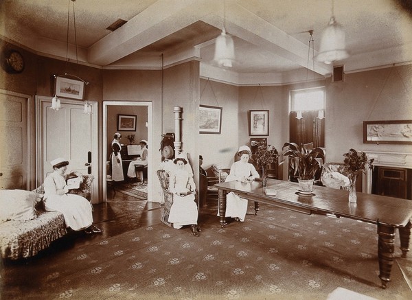 Great Northern Central Hospital, Holloway Road, London: the nursing staff in the common room. Photograph, 1912.