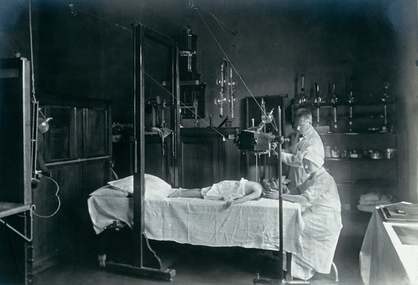 University Children's Hospital, Vienna: a child having an x-ray. Photograph, 1921.