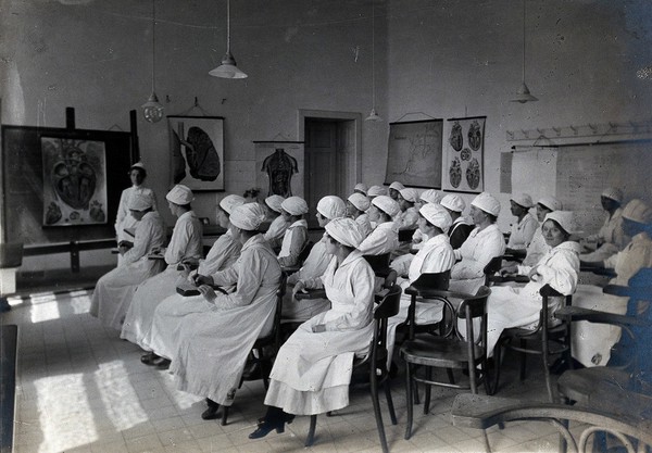 University Children's Hospital, Vienna: nurses taking notes in a classroom. Photograph, 1921.