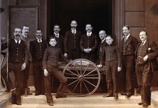 Charing Cross Hospital: portrait of the porters. Photograph, 1906.