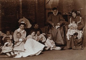 view St Mary's Hospital, Plaistow: patients, children and a nurse. Photograph, 1904.