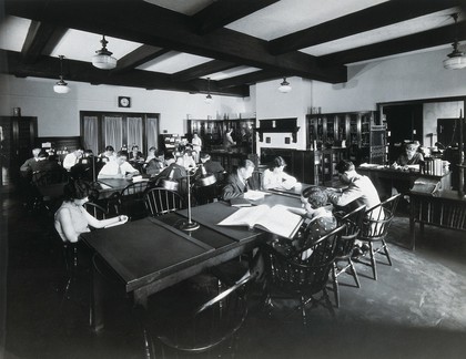 Philadelphia College of Pharmacy and Science: college library with students reading. Photograph, c. 1933.