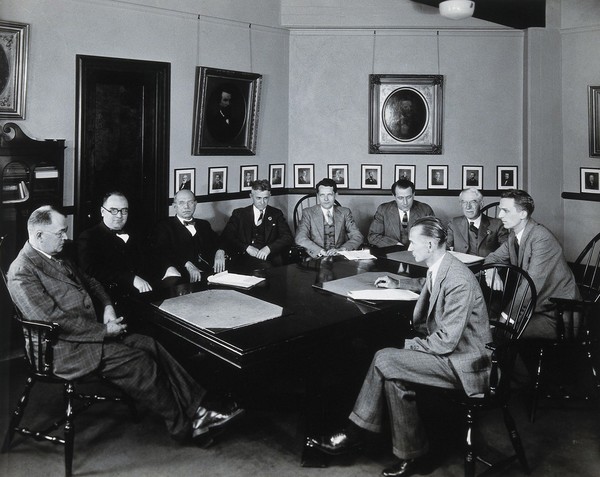 Philadelphia College of Pharmacy and Science: men in a conference room. Photograph, c. 1933.