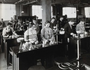 view Philadelphia College of Pharmacy and Science: students being taught in a laboratory-style classroom. Photograph, c. 1933.