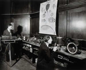 view Philadelphia College of Pharmacy and Science: students experimenting in a laboratory. Photograph, c. 1933.