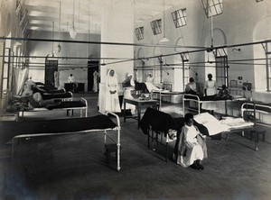 view Lady Hardinge Medical College and Hospital, Delhi: nurses and children patients on a ward. Photograph, 1921.