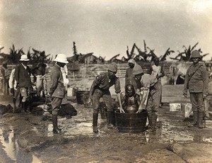 view Hospital staff disinfecting patients during the outbreak of bubonic plague in Karachi, India. Photograph, 1897.