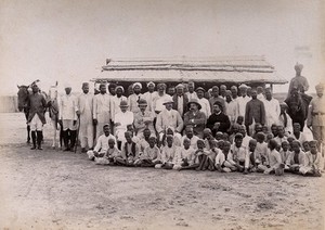 view Patients and staff at a hospital camp, during the outbreak of bubonic plague in Karachi, India. Photograph, 1897.