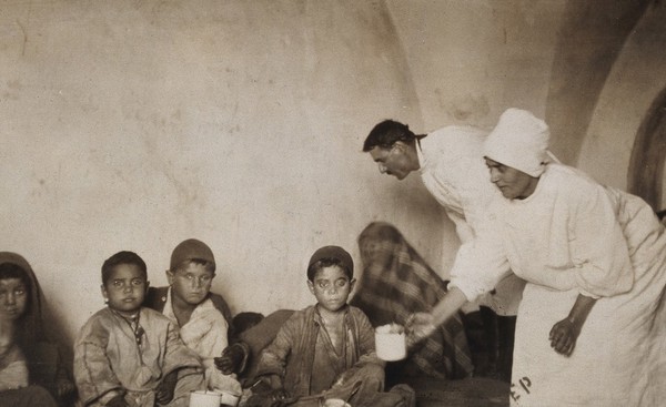Smallpox epidemic, Palestine: patients and workers in hospital. Photograph.