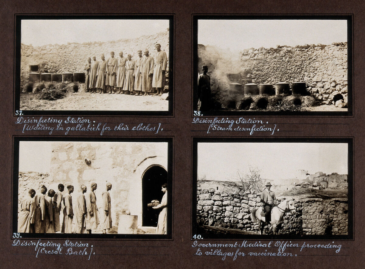 Smallpox epidemic, Palestine: men waiting for their disinfected clothes. Photograph.