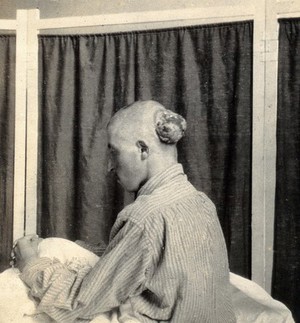 view Military Hospital V.R. 76, Ris-Orangis, France: soldier with head wound from battle at Verdun in 1st world war. Photograph, 1916.