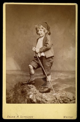 Leonard Schuster standing on a rock, facing left. Photograph by Frank M. Sutcliffe, c. 1893.