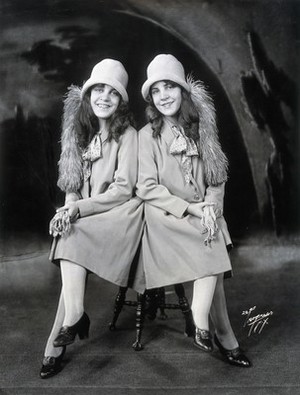 view Daisy and Violet Hilton, conjoined twins, dressed to go out. Photograph, c. 1927.