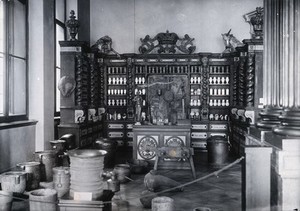 view The interior of an old pharmacy reproduced in the National Museum, Prague. Photograph by Z. Reach.