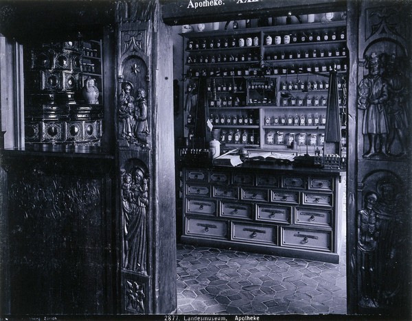 Landesmuseum, Zürich: reconstruction of a seventeenth-century apothecary's shop with carved wooden entrance, in the. Photograph.