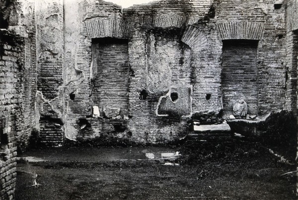 An ancient building which used to be a pharmacy site in the House of the Vestal Virgins, Rome. Photograph.