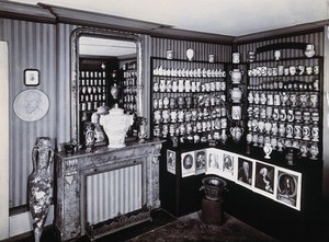 view Part of the collection of pharmaceutical and medical antiques collected by Burkhard Reber and exhibited in Geneva in 1904. Photograph.