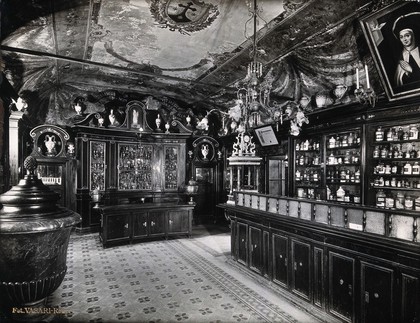 The ornate interior of the pharmacy at the Ospedale del Santo Spirito in Rome. Photograph.