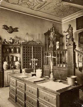 The interior of a seventeenth-century apothecary's shop recreated for the German National Museum in Nürnberg. Photograph.