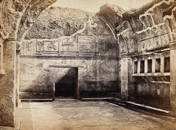 Pompeii: the partly ruined interior of the men's tepidarium. Photograph by R. Rive.