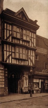 The church of St. Bartholomew the Great; exterior view of restored gate house. Photograph by Bedford Lemore, c. 1916.