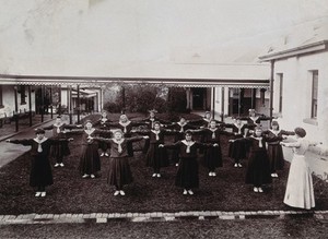 view Metropolitan Lunatic Asylum, Kew, Victoria, Australia: female patients exercising. Photograph.