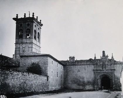 Hospital del Rey, Burgos: exterior, showing the church tower and the pilgrims' gateway. Photograph, ca.1900.