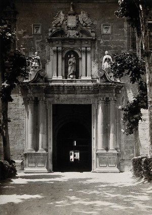 view Lunatic asylum (once a convent), Granada: gateway. Photograph, ca.1900.