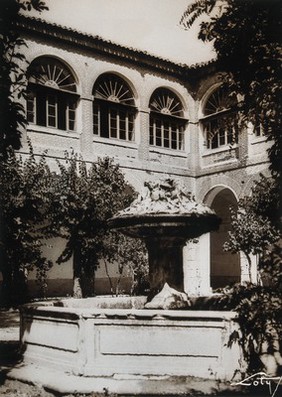 Hospital, Medina del Campo: the fountain in the courtyard. Photograph, ca.1900.